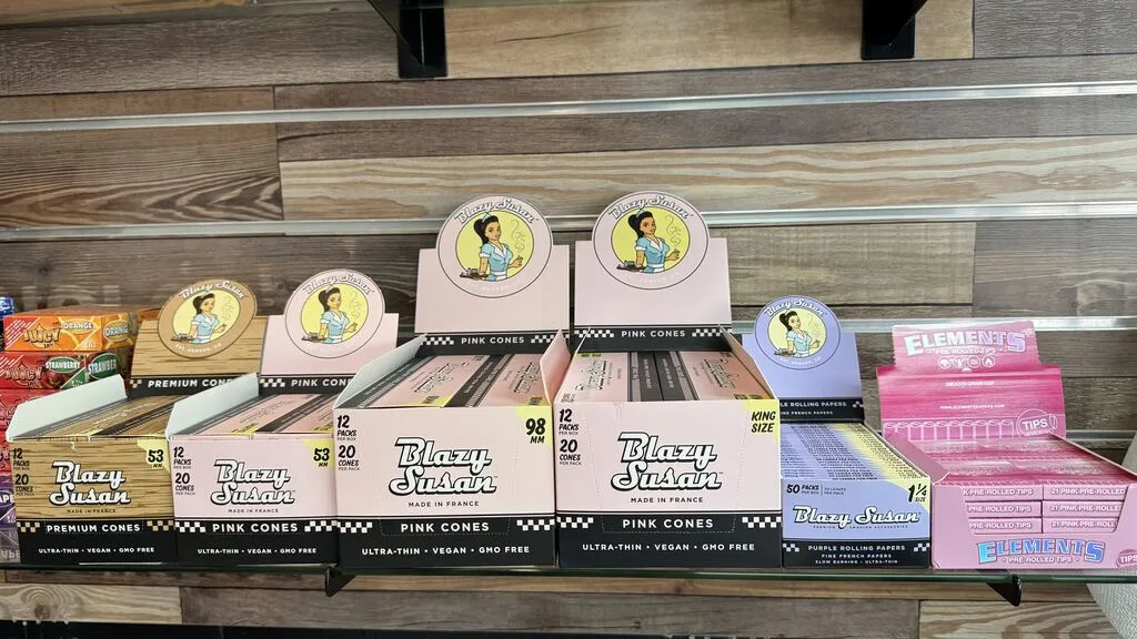 Blazy Susan cones and Elements papers on a shelf