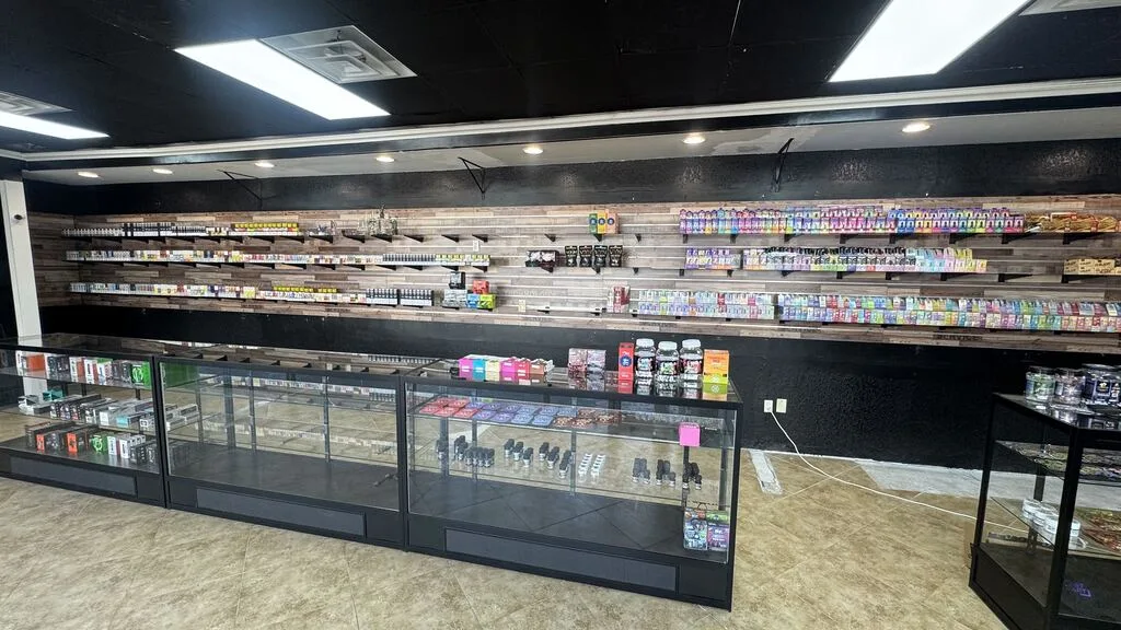 Disposable vape wall behind glass display cases