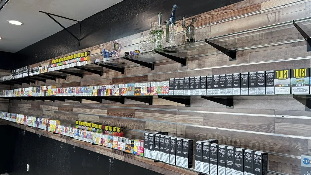 Shelves of e-liquid and vape accessories